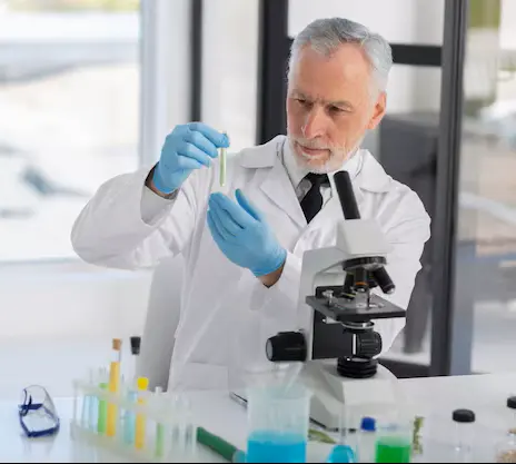 Researcher analyzing peptide samples to evaluate purity and remove interference factors.